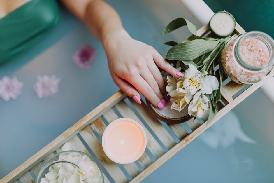 Elegant spa setting with flowers, bath salts, and calming ambiance